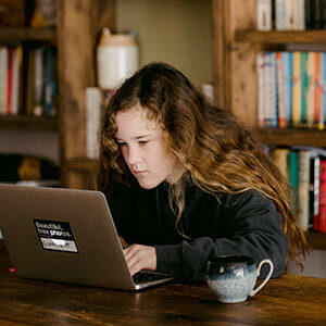 foster care sa pre teen using laptop